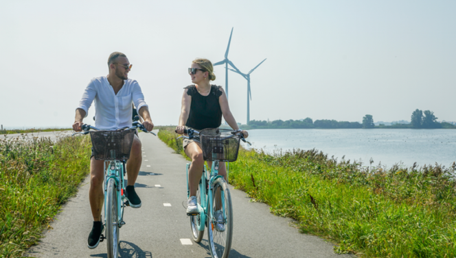 Couple cycling in the summer